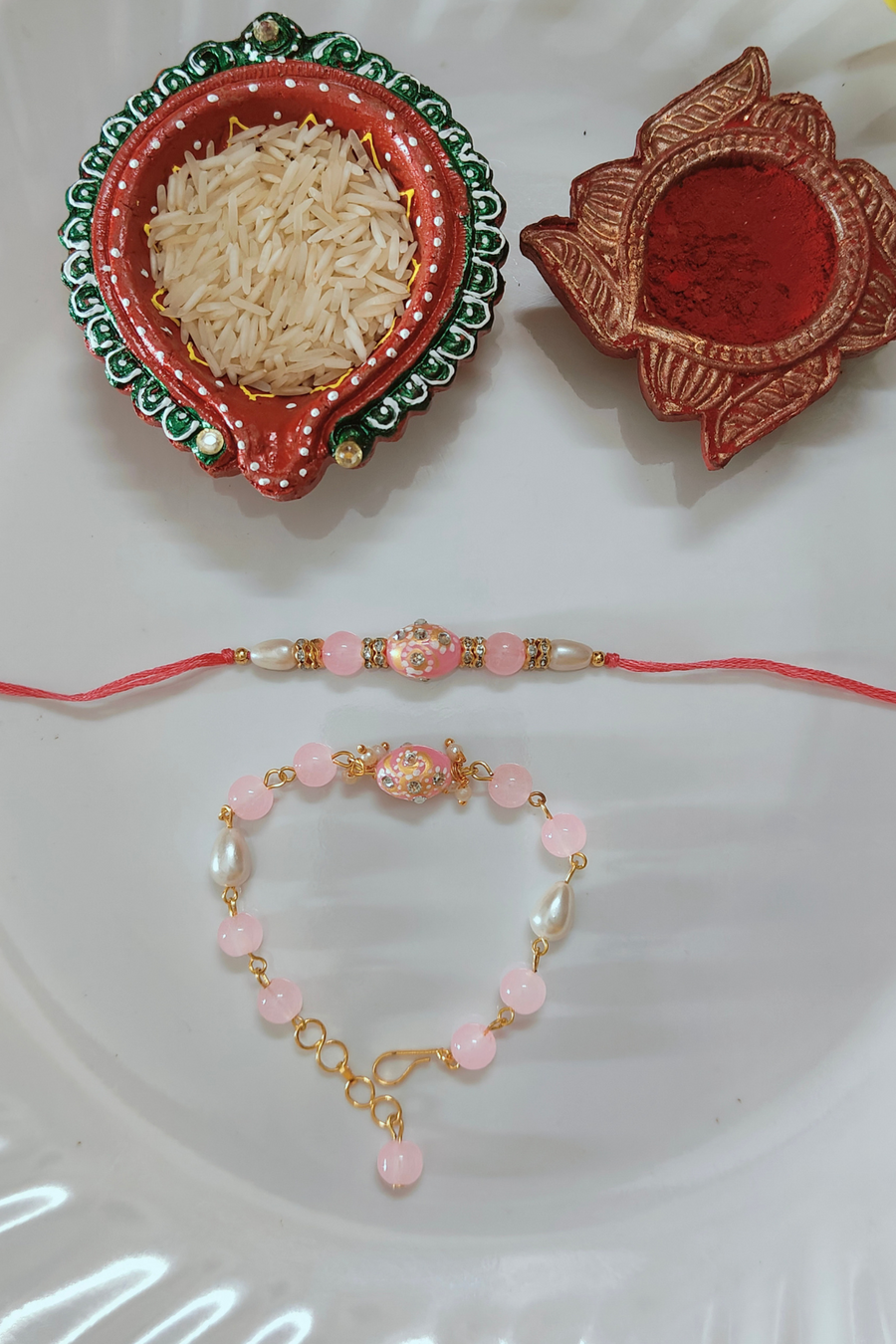 Pink Tumble Beads Couple Rakhi