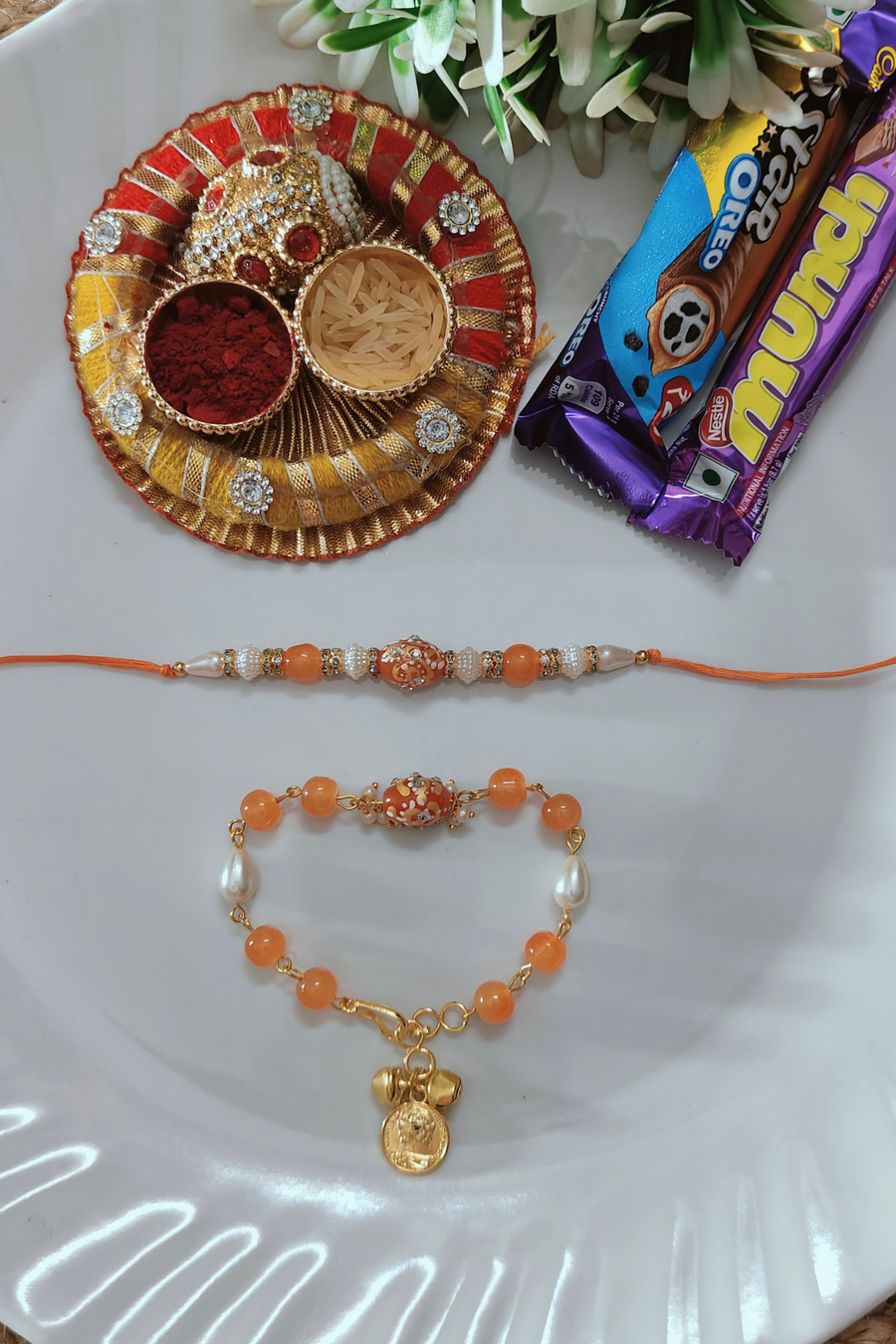Orange Tumble Beads Couple Rakhi( free Roli Chawal Bottle & Chocolate)